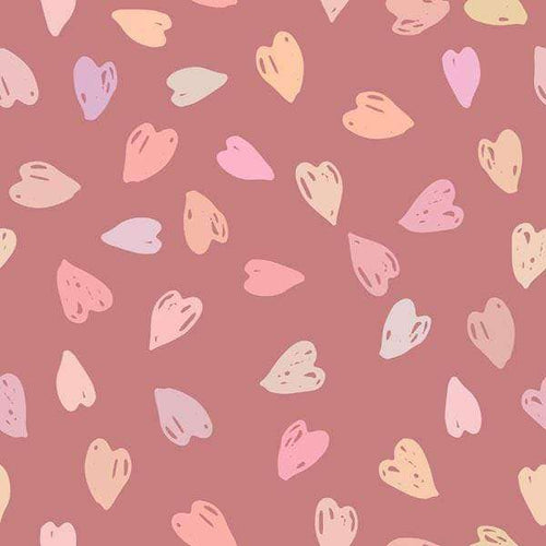 Assorted pastel hearts on a mauve background