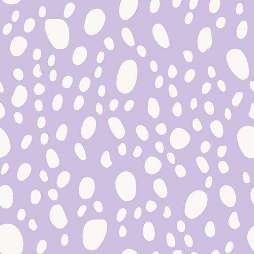 Abstract lavender background with random white speckles pattern