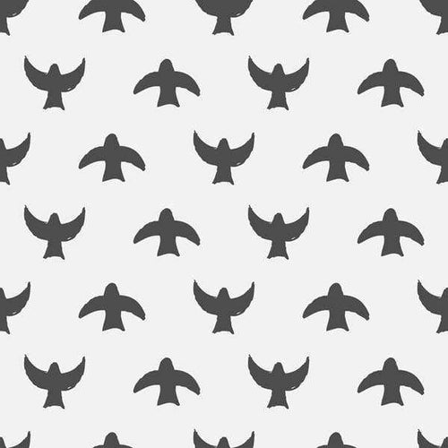 A repeating pattern of bird silhouettes in grayscale