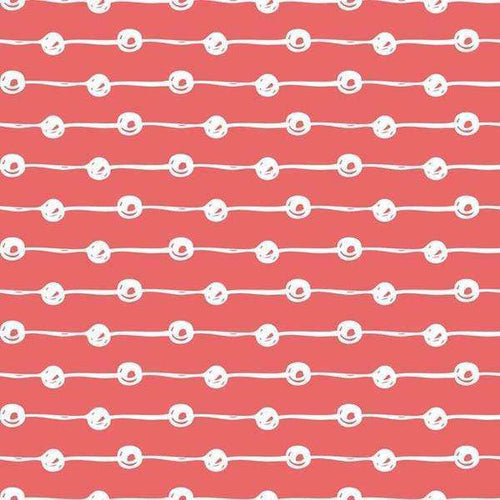 Repeated button pattern on a coral background
