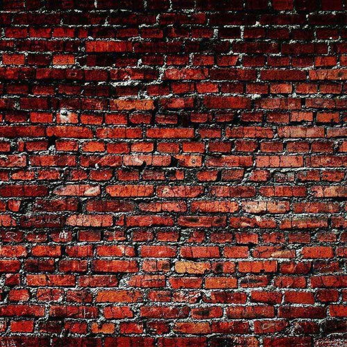 Aged brick wall with rich red and brown tones