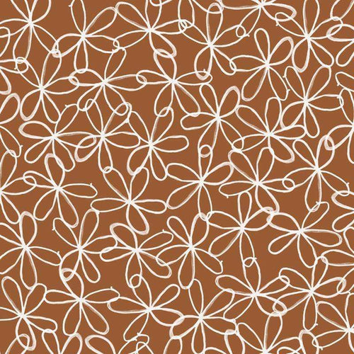 White floral patterns on a warm brown background