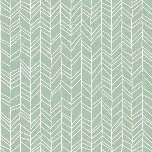 Elegant sage green and white herringbone pattern with subtle speckles