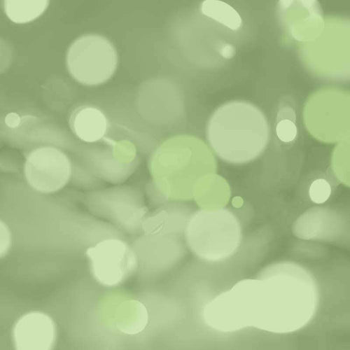 Abstract pattern with soft green blurry circles reminiscent of a bokeh effect