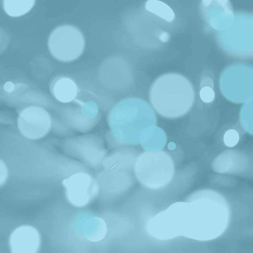 Abstract pattern of blurry light blue circles on a darker blue background