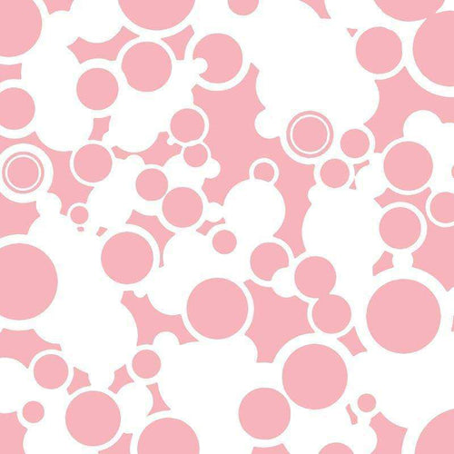 Abstract pattern with various sized circles in shades of pink on white background