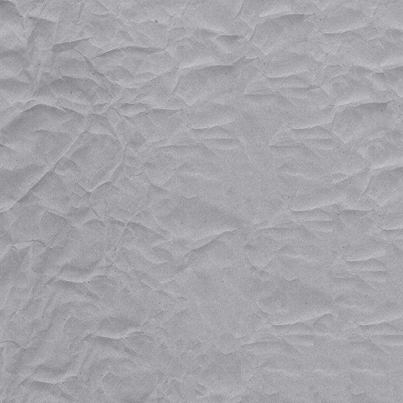 Grey crinkled paper texture resembling natural stone