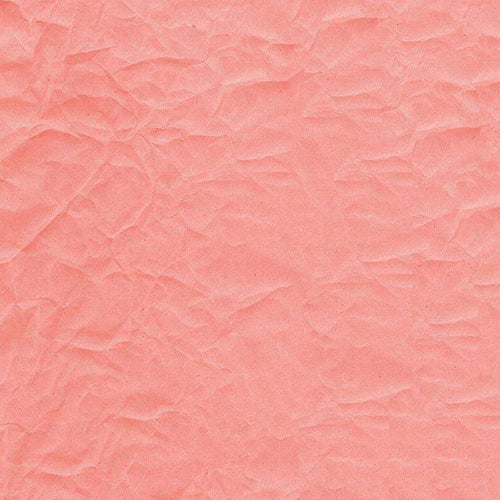 Crumpled paper texture in soft pink