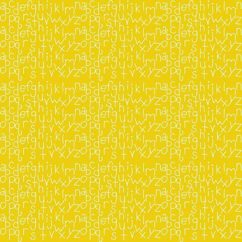 Alphabet letters scattered on a mustard yellow background