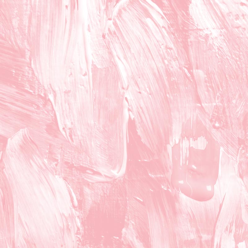 Abstract pink paint smears on a canvas