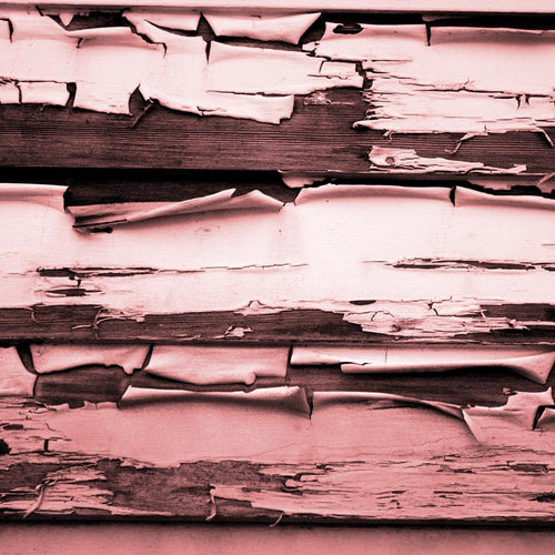 Distressed Texture of Peeling Pink Paint on Wooden Planks