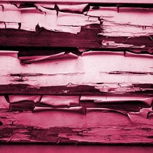 Peeling paint on wooden planks rendered in shades of crimson