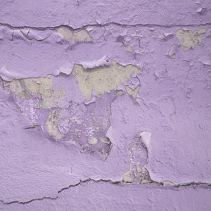 Weathered purple texture with crackling paint