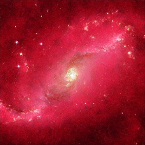 A spiral galaxy pattern with a dominant red and pink color scheme