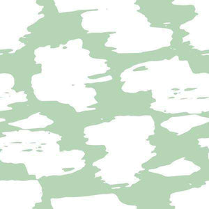 Abstract brushstroke pattern in white on a sage green background
