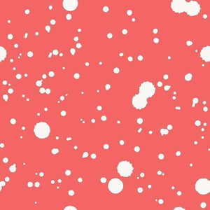 Abstract pattern of white splashes on a coral background