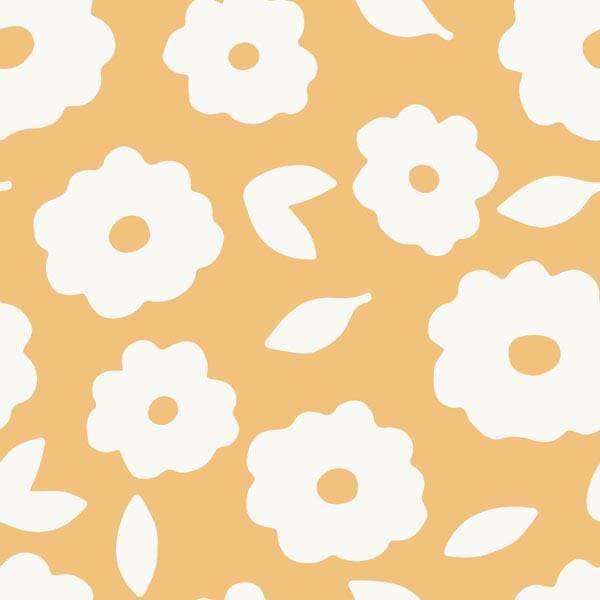 Simple floral and leaf pattern on a warm apricot background