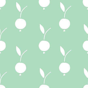 Stylized white apple pattern on mint green background