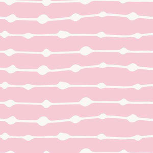 Pink background with a repeating bone pattern