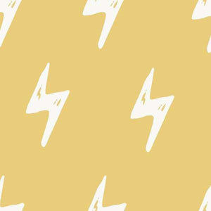 Abstract mustard yellow background with white lightning bolt pattern
