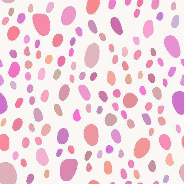 Abstract pattern with random speckles in pastel colors on a light background