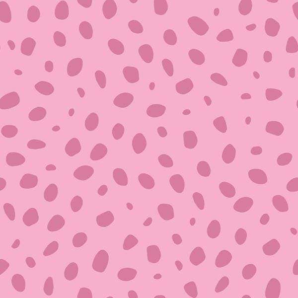 A pink background with scattered mauve spots