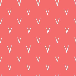Abstract pattern of white chevrons on a salmon pink background