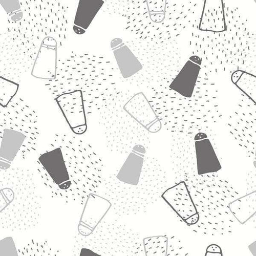 Scattered salt shakers on a spotted gray background
