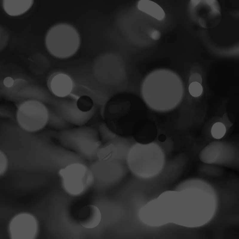 Abstract black and white pattern with varying circles and bokeh effect