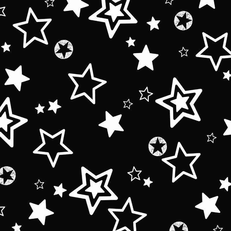Assortment of white stars of various sizes on a black background