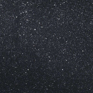 A dark background speckled with white resembling a starry sky