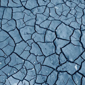 Blue cracked clay pattern