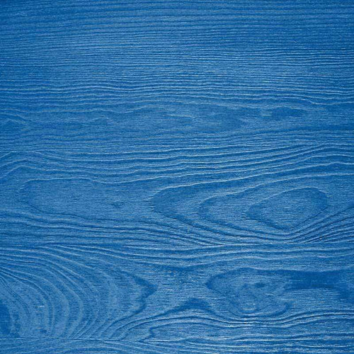 Textured blue wooden surface resembling calm waves