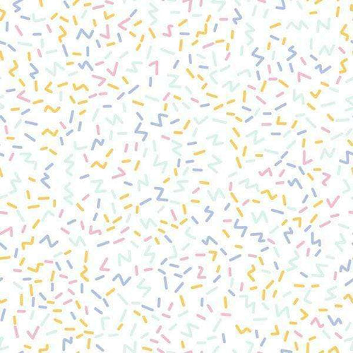 Abstract pastel confetti pattern on a white background