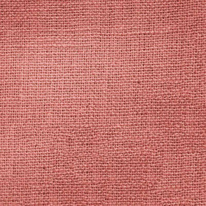 Close-up of a coral pink woven fabric pattern