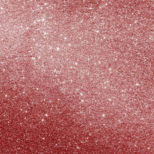Close-up of a glittery pink surface with sparkling accents