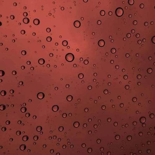 Red textured background with water droplet pattern