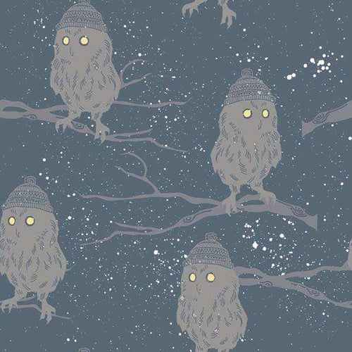 Illustrated night-time pattern featuring owls with knitted hats on branches