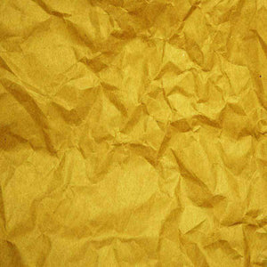 Crumpled golden paper texture
