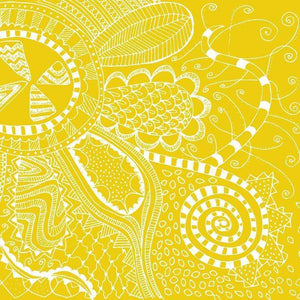 Intricate white mandala pattern on a yellow background