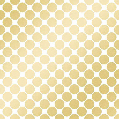 Seamless golden polka dot pattern on a cream background