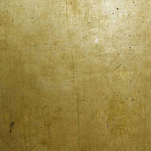 Scratched golden surface with a distressed texture