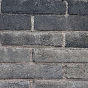 Textured gray brick wall pattern