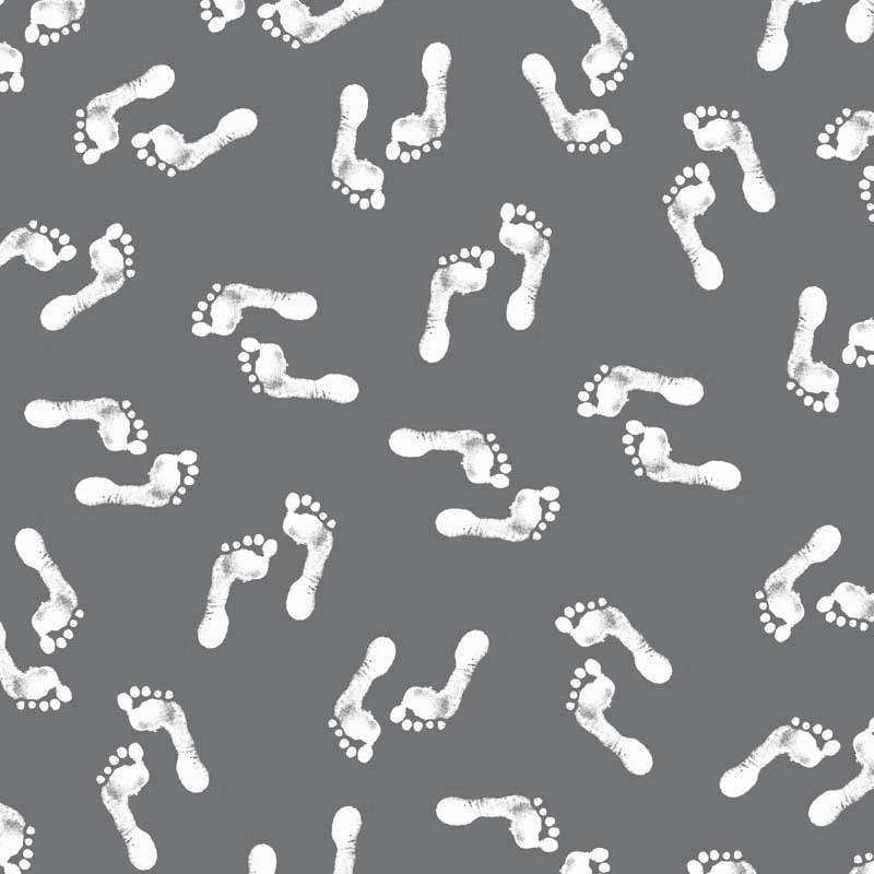 Assorted white footprints on a slate grey background