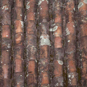 Close-up of aged terracotta tiles with weathering