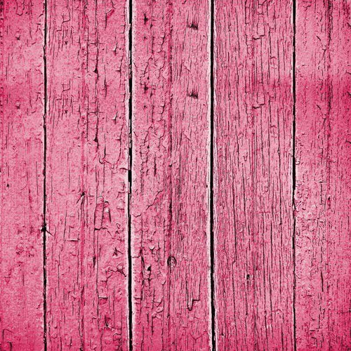 Weathered pink wooden planks
