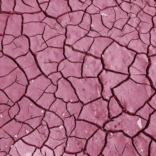 Broken pink surface pattern resembling dry earth