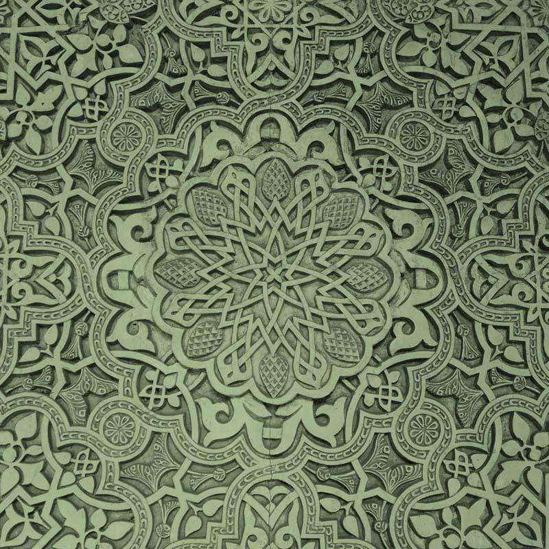 Intricate green arabesque pattern