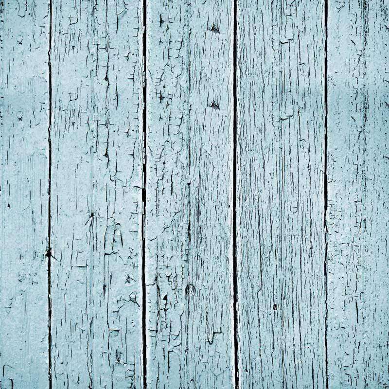 Weathered pale blue wooden planks