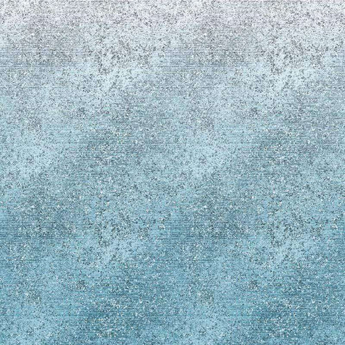 Abstract blue speckled pattern fading into white